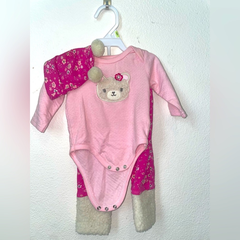 0-3 month pajama set. Includes pants, shirt, and matching sleep hat.